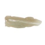 A Chinese celadon jade fish pendant, early 20th century, carved as a fish with incised details