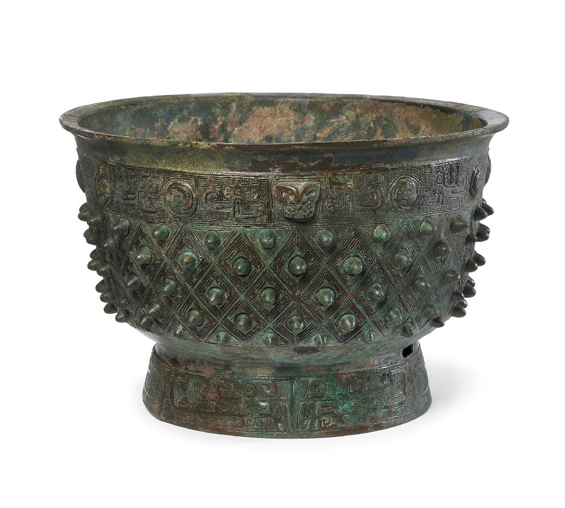 A rare Chinese archaic bronze ritual food vessel, Yu, late Shang dynasty, the deep bowl cast with