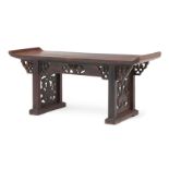 A Chinese rosewood stand, 19th century, modelled as an altar table with pierced frieze, 23.5cm