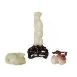 Three Chinese hardstone carvings, 18th-19th century, comprising a white jade carving of a woman with