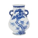 A Chinese porcelain vase, hu, Republic period, painted in underglaze blue with prunus blossom,