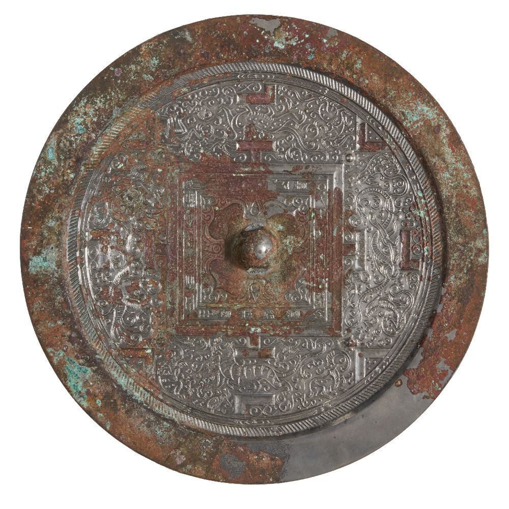 A large Chinese silvered bronze 'TLV' mirror, Western Han dynasty, finely cast with the 'Four - Image 3 of 3