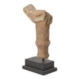 A Khmer sandstone hand of Vishnu, Angkor period, 11th - 12th century, carved holding a club, 15cm