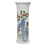 A Chinese porcelain wucai beaker vase, 17th century, painted with flowering peony blossoms emanating