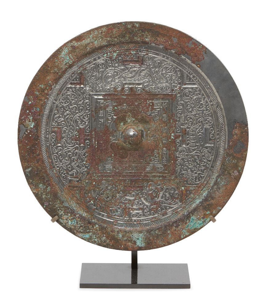 A large Chinese silvered bronze 'TLV' mirror, Western Han dynasty, finely cast with the 'Four