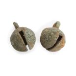 Two Chinese bronze animal bells, Neolithic period, each of spherical form with loop attachment, 2.