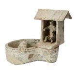 A Chinese pottery model of a pig sty latrine, Han dynasty, the raised latrine with sloping roof