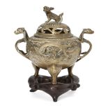 A Chinese polished bronze censer and cover, 19th century, modelled with chilong dragon handles, a