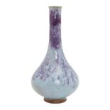 A Chinese porcelain junyao style bottle vase, Republic period, with overall lavendar glaze