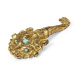 A Chinese gilt bronze belt hook, Han dynasty, finely cast as a tiger's head with turquoise inset