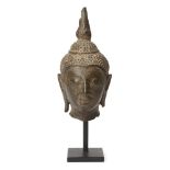 A Thai bronze head of Buddha, U-Thong style, 15th century, 14cm high Provenance: Private German