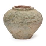 A Chinese pottery green-glazed squat jar, Han dynasty, moulded with a band beneath the rim of