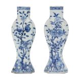 A pair of Chinese porcelain vases, Wanli period, painted in underglaze blue with fruiting peach