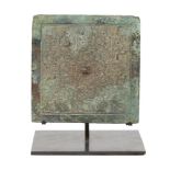 A Chinese bronze square mirror, Eastern Zhou/Warring States period, 5th/4th century BCE, finely cast