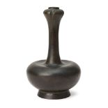 A Chinese bronze 'garlic-mouth' small vase, 19th century, with squat body to long slender neck and