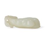 A Chinese greenish-white jade bean pendant, 18th/19th century, finely carved as a branch issuing