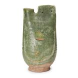 A Chinese pottery green-glazed flask, Liao dynasty, with single lug handle pierced with two holes,