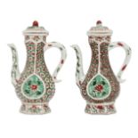 A pair of Chinese porcelain hexagonal ewers and covers for the Islamic market, Kangxi period,