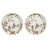 A pair of Chinese export porcelain saucer dishes, 18th century, painted in famille rose enamels with