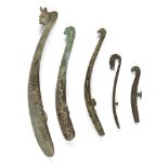 Five Chinese bronze belt hooks, Warring States - Han dynasty, one inlaid with gold, two inlaid