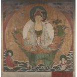 A Sino-Tibetan thangka, 19th century, centred with a seated deity seated on a rock within a