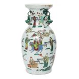 A Chinese porcelain baluster vase, early 20th century, painted in famille rose enamels with the