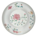 A Chinese porcelain dish, 20th century, painted in famille rose enamels with sprays of flowering