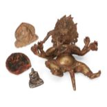 A Tibetan copper alloy figure of Mahakala, 18th/19th century, 19cm high, a silvered bronze minaiture