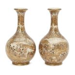 A pair of Japanese miniature Satsuma bottle vases by Hattori, late 19th century, finely decorated in
