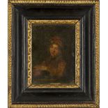 Follower of Samuel Dirksz van Hoogstraten, Dutch 1627-1678- Portrait of a young boy, seated half-
