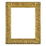 A Bolognese Carved and Gilded Frame, 17th/18th century, with cavetto sight, bar and bead coarse, the