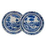 A pair of Dutch Delft blue and white earthenware chargers, late 18th/early 19th century, each of