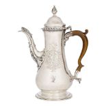 A George III silver coffee pot, London, c.1764, Benjamin Bickerton, of baluster form with stylised