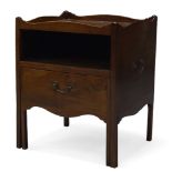 A George III mahogany commode, with shaped raised gallery, above open compartment and deep drawer,