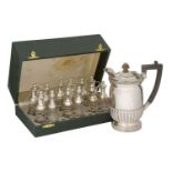 A boxed Italian silver cruet set comprising six trio cruets, each with two silver-capped glass