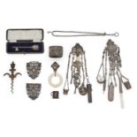 A Victorian silver chatelaine, Charles Boyton, London 1888, of typical form, decorated with