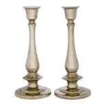 A pair of Thai silver candlesticks, of tapering, baluster form with urn-shaped capitals and