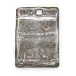 A white metal calling card case, repousse decorated with hunting scenes set amid rich foliage, one