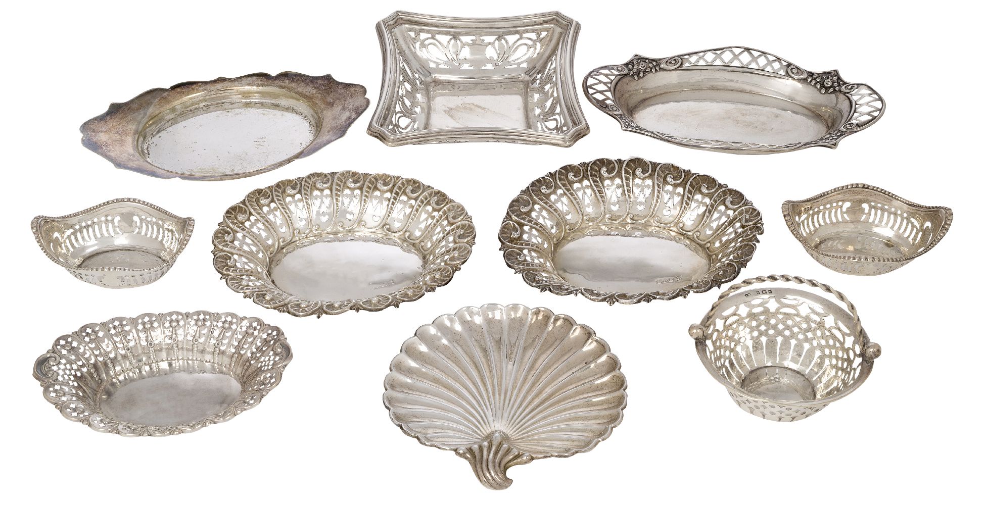 A collection of nine silver bonbon dishes, various shapes, sizes, dates and makers including: a