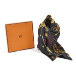 A Hermes silk scarf, in a black palette with distinctive key design, stamped 'HERMES, PARIS', 91cm x