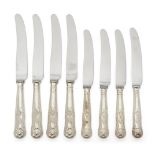 A set of four each silver-handled dinner and dessert knives, Sheffield, c.1948, maker IL, all with