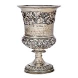 A Georgian silver presentation goblet, London, c.1822, Rebecca Emes & Edward Barnard I, repousse