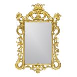 A Victorian giltwood mirror of large proportions, the rectangular form body designed with gilt