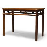 A Chinese hardwood altar table, second half 20th Century, the rounded rectangular top above open