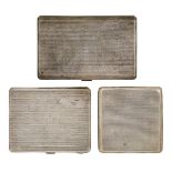 Three silver cigarette cases, the largest, Birmingham, c.1931, Adie Brothers, of engine turned