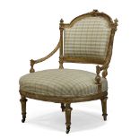 A late Victorian gilt gesso nursing chair, the shaped back centred by carved bow, with tapered