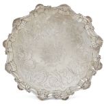 A George III silver salver, London, c.1762, Ebenezer Coker, raised on three scroll feet, with