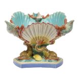 A Royal Worcester Majolica centrepiece bowl, 19th century, modelled as a shell with three smaller