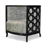 A modern ebonised tub armchair, of recent manufacture, with pierced decorative frame and velvet