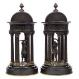 A pair of Italian black slate and bronze temple models, late 19th century, each centred by a dancing